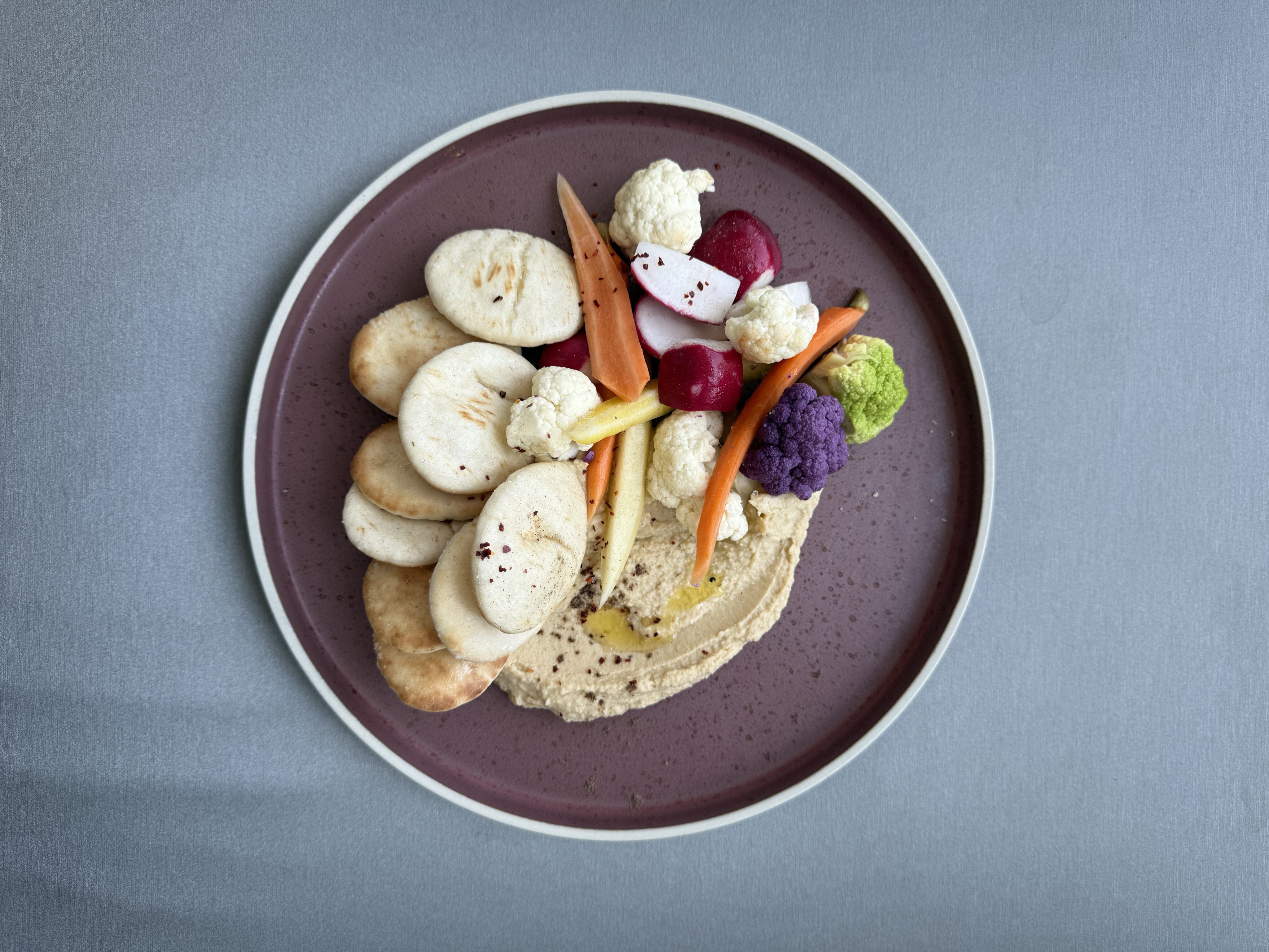 Hummus plate from Nest on Four, a sports bar near Mercedes-Benz Stadium and State Farm Arena