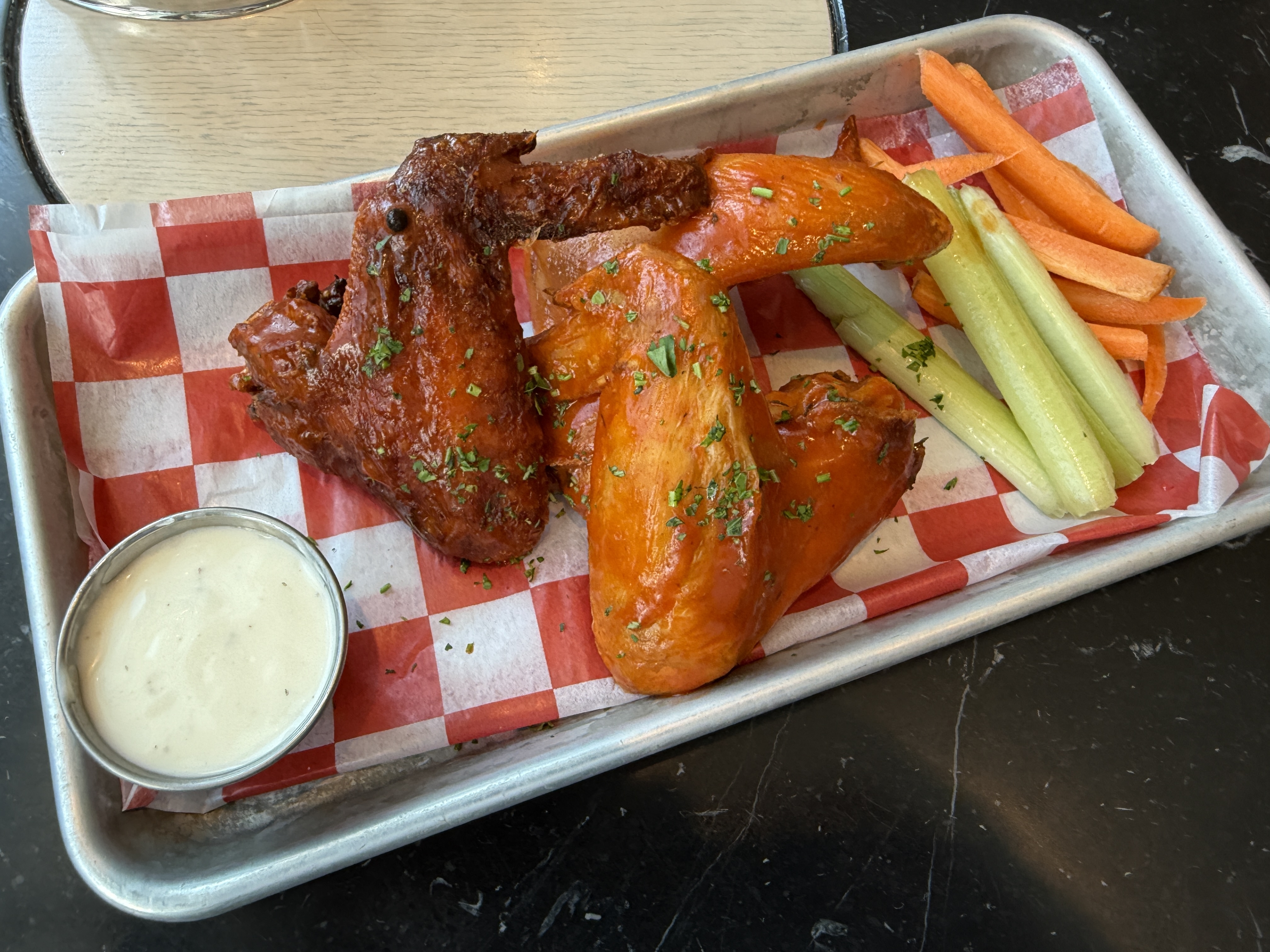 Cider-Brined Whole Wings from Nest on Four, a sports bar near Mercedes-Benz Stadium and State Farm Arena