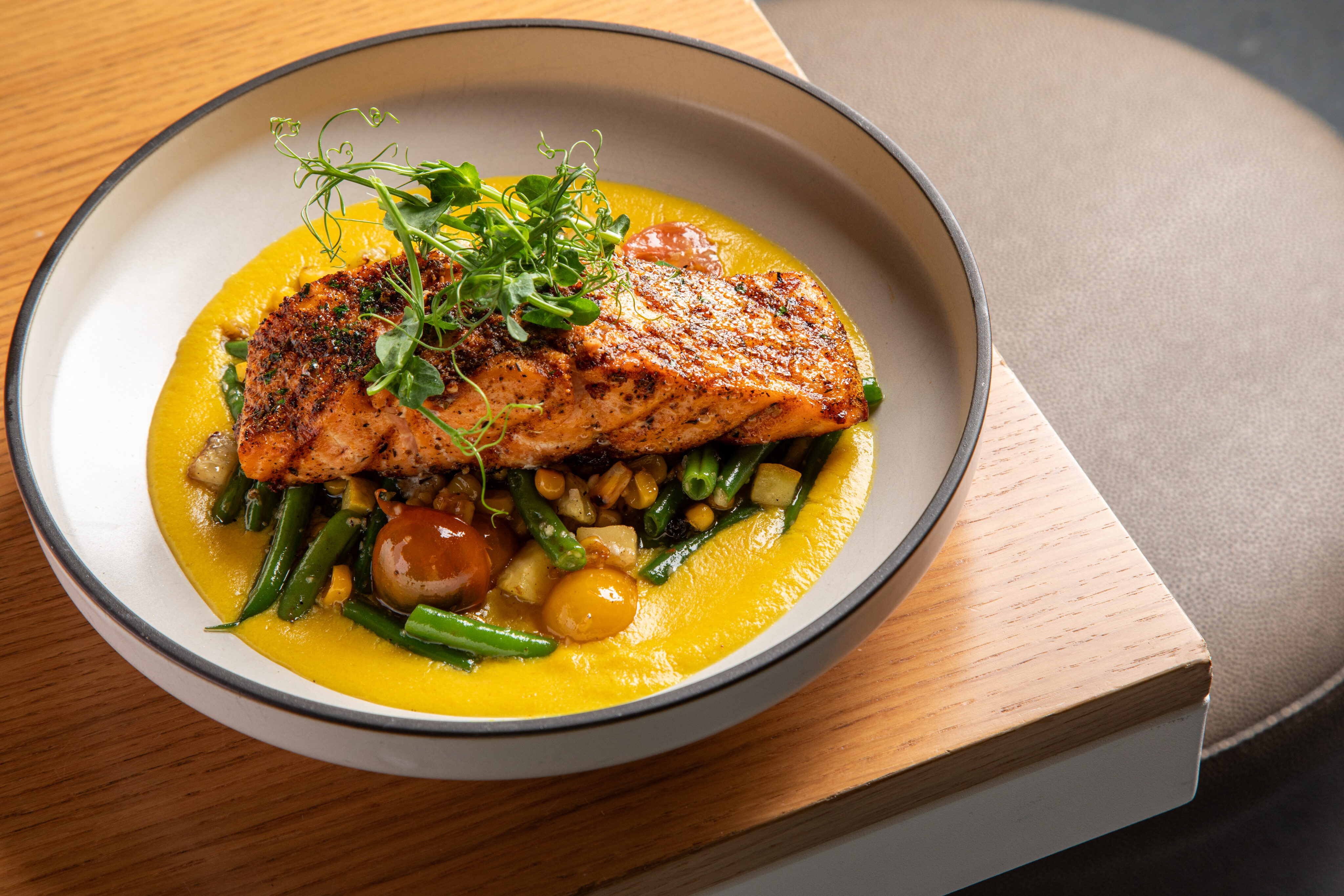 Salmon Entree at Nest on Four, a sports bar near Mercedes-Benz Stadium